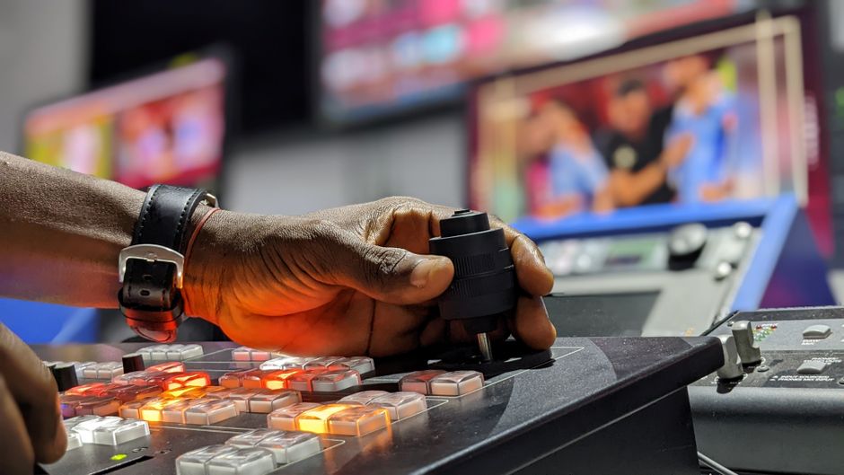Compact video switcher control panel on a production desk