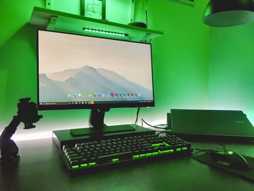 Slim key light panel illuminating a desk streaming setup